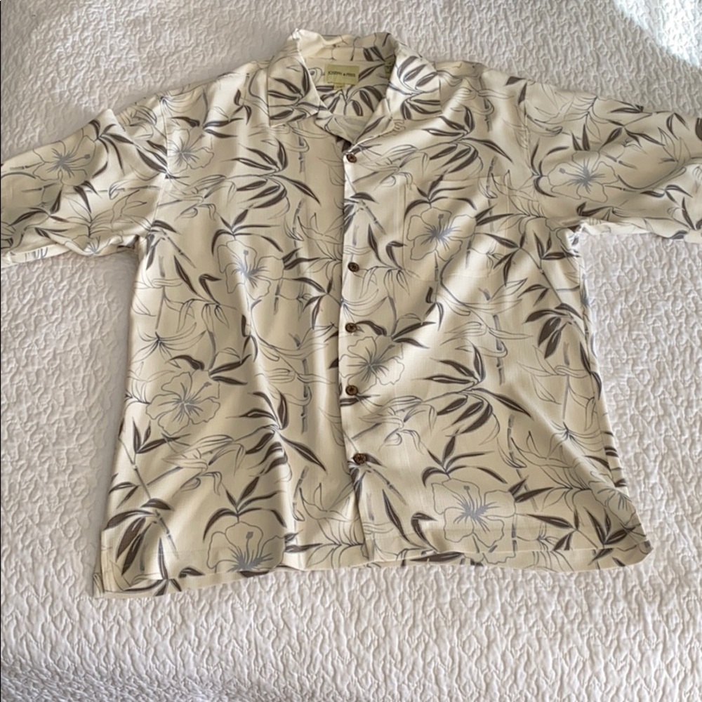 Tropical print polo in size large